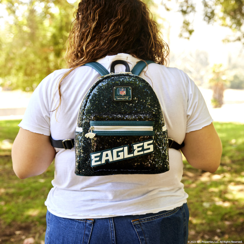 Image of woman facing away from camera wearing the NFL Philadelphia Eagles Sequin Mini Backpack 